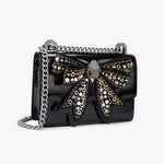 Afbeelding in Gallery-weergave laden, Kurt Geiger Bow Small Shoreditch Black/Comb-Patent/Leather
